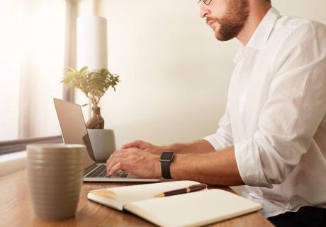 Man Sitting At Laptop eaab8e44