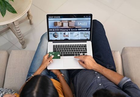 couple doing shopping online with credit card CCBZM3F 4128827a